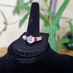 Travel ring by Heng Ngai, colorless amethyst and garnet